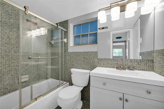 a view of a room with a large window