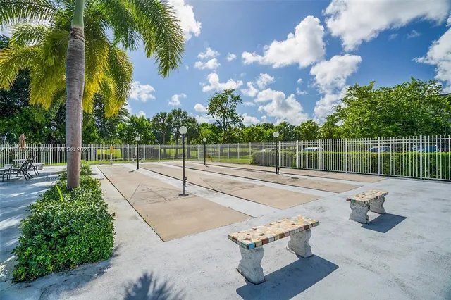 a view of swimming pool from a balcony