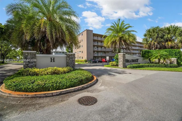 a view of a street with a building in the background