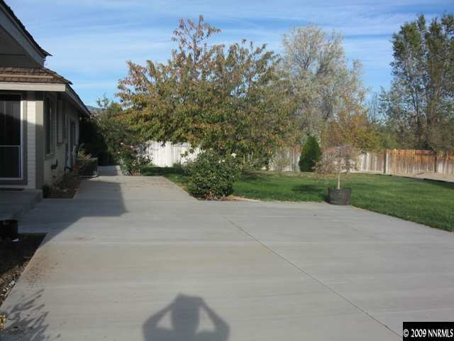 1275 High Chaparral Drive Reno, NV 89521 - Photo 9 of 9 a pathway of a house with a yard
