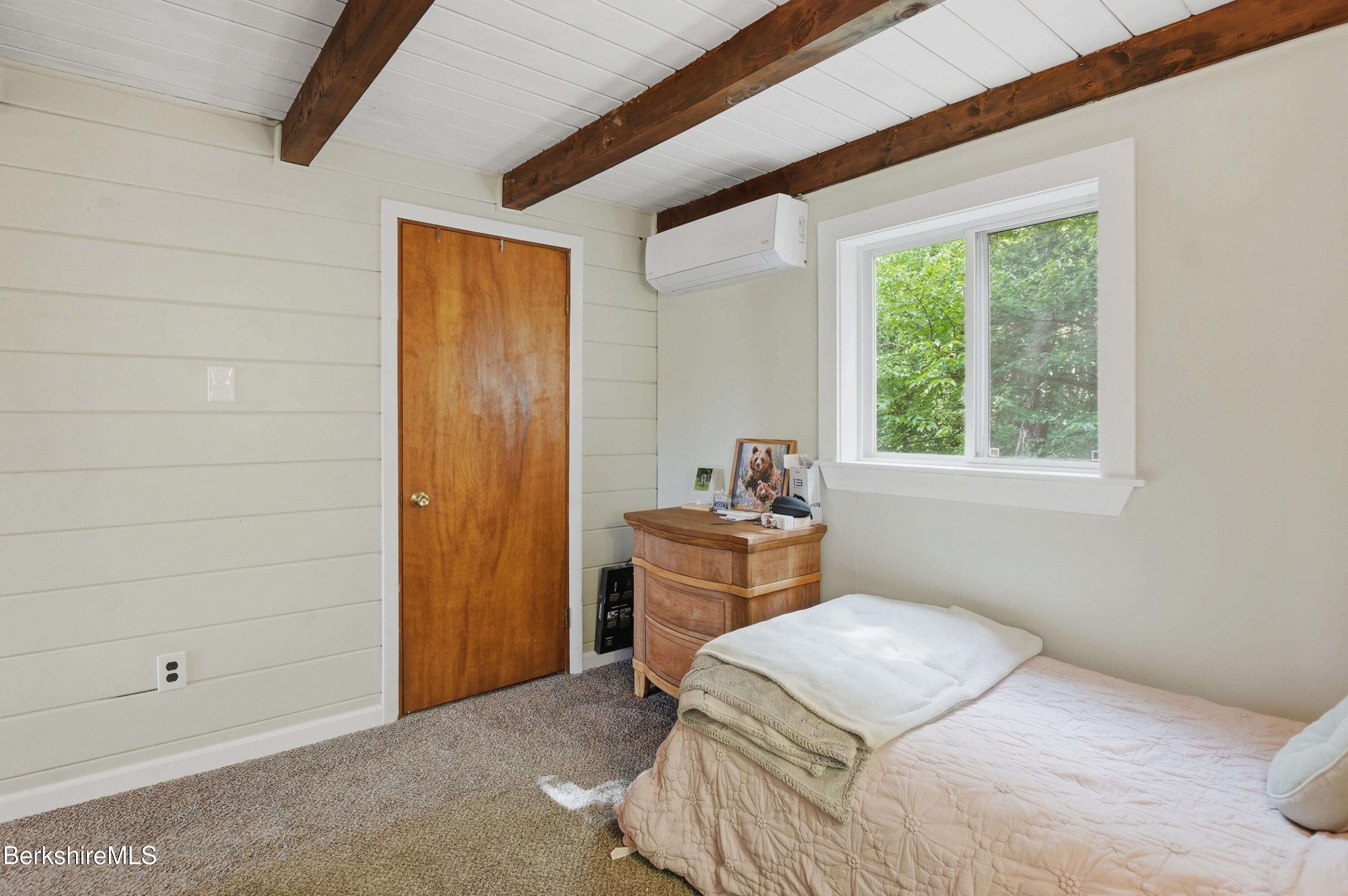 4 David Drive Peru, MA 01235 - Photo 25 of 44 a bedroom with a bed and a dresser