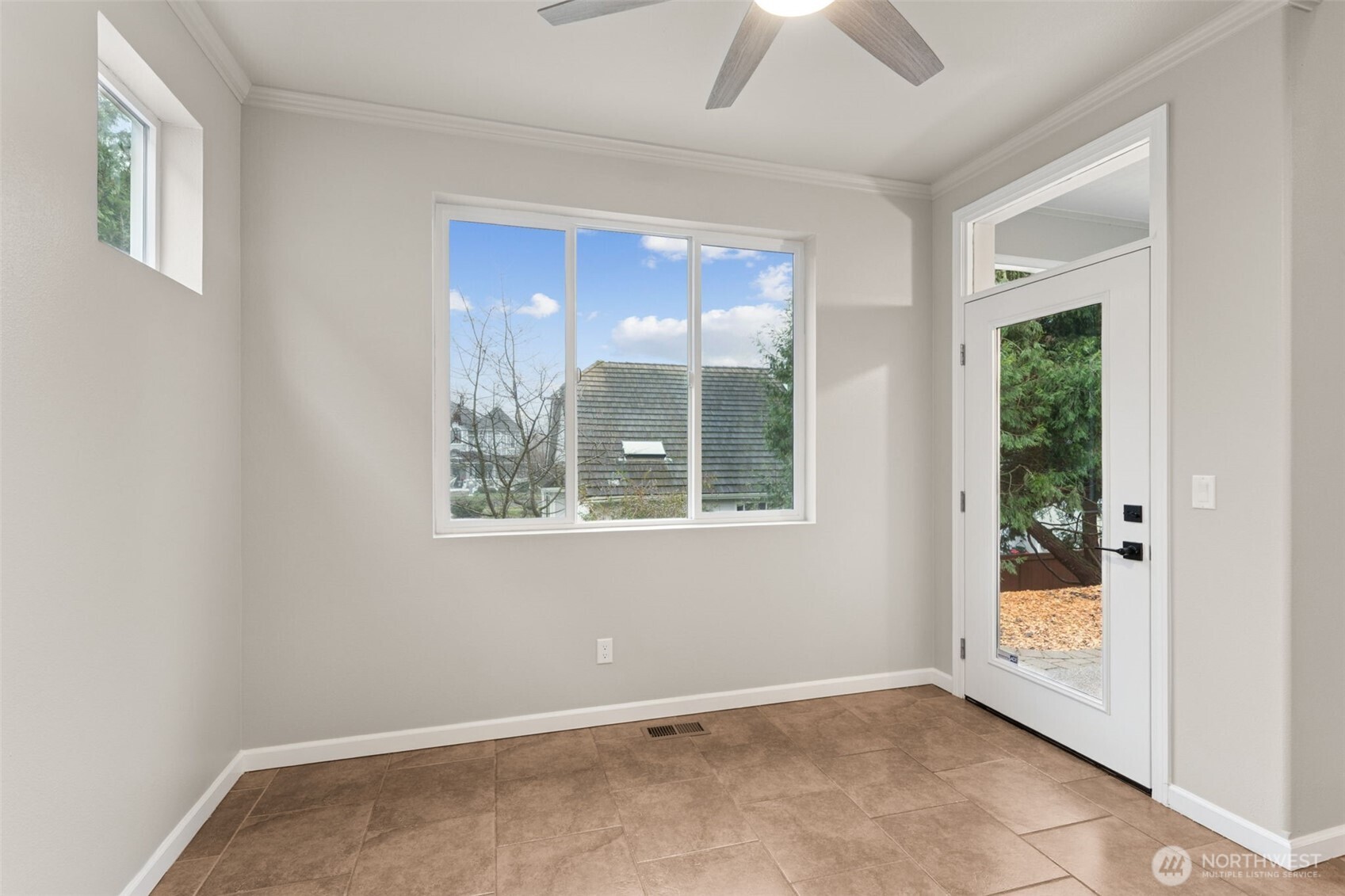 9248 Periwinkle Loop Northeast Olympia, WA 98516 - Photo 14 of 39 a view of an empty room with a window