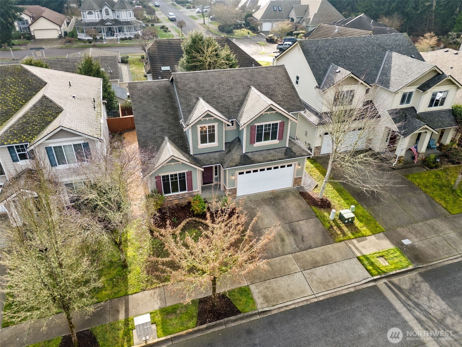 9248 Periwinkle Loop Northeast Olympia, WA 98516 - Photo 18 of 39 an aerial view of a house with a yard