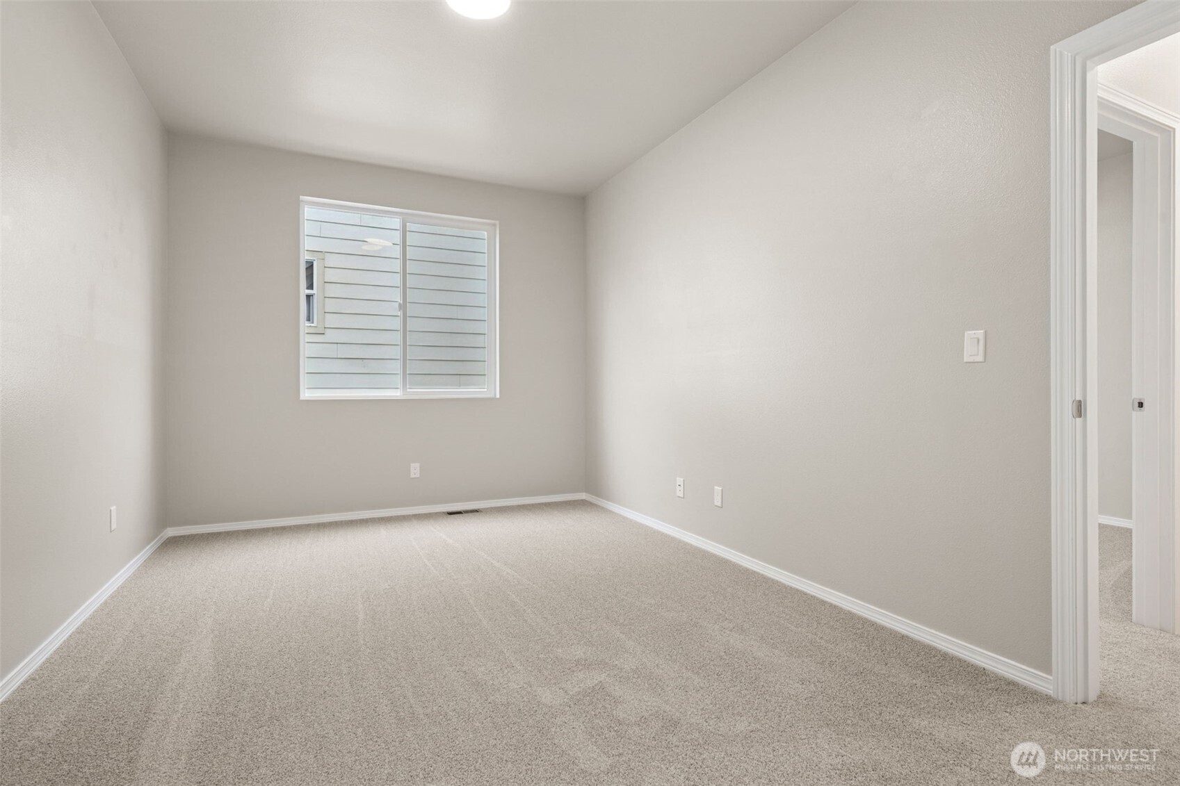 9248 Periwinkle Loop Northeast Olympia, WA 98516 - Photo 28 of 39 an empty room with a window