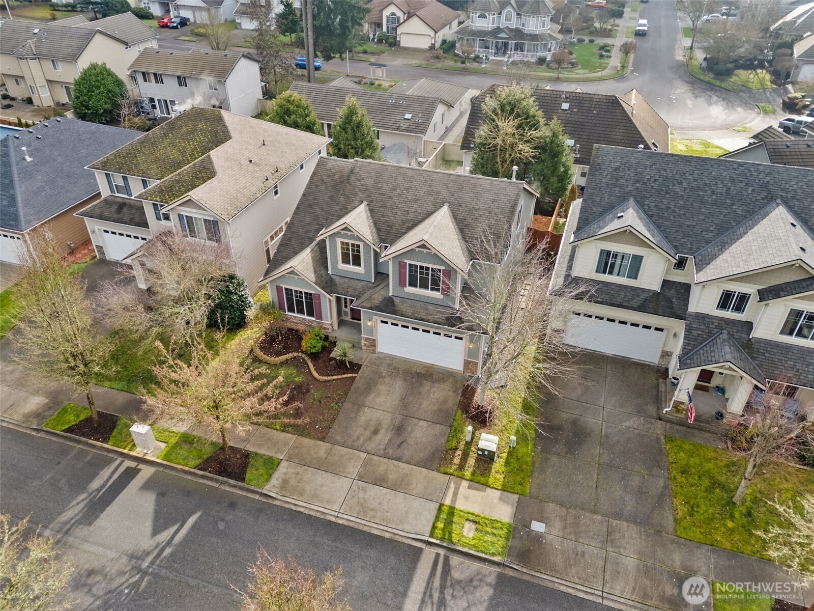 9248 Periwinkle Loop Northeast Olympia, WA 98516 - Photo 30 of 39 an aerial view of a house with a yard