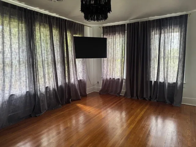 a view of a storage and utility room with washer and dryer
