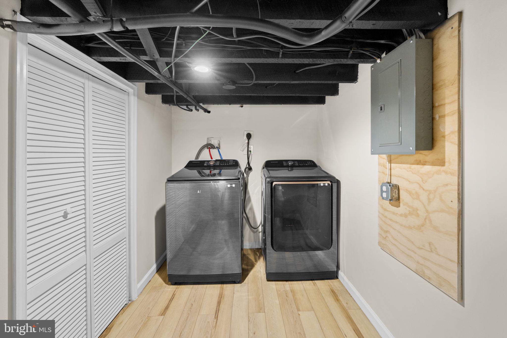 3111 Foster Avenue Baltimore, MD 21224 - Photo 20 of 28 a utility room with wooden floor washer and dryer