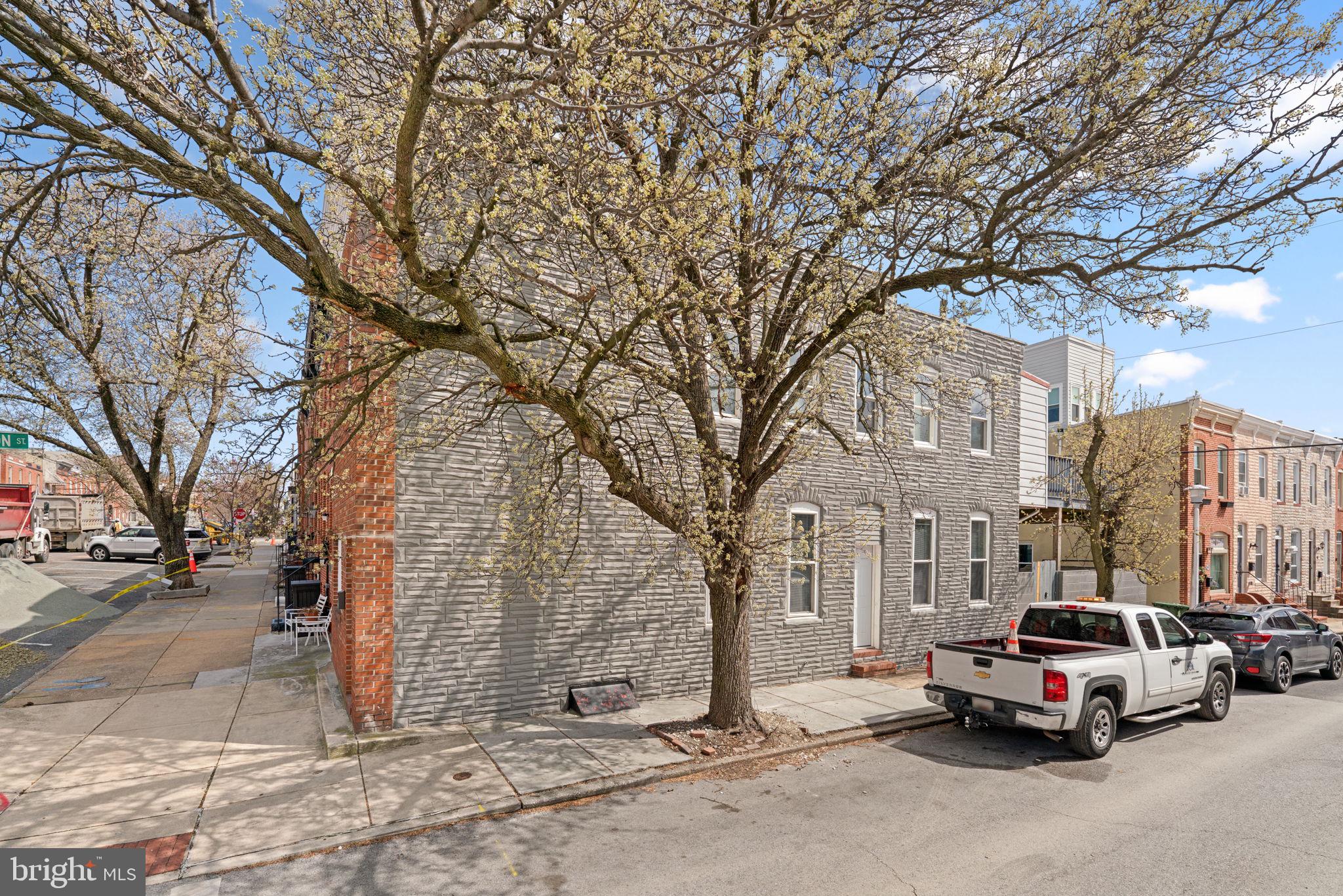3111 Foster Avenue Baltimore, MD 21224 - Photo 24 of 28 a car parked on the side of a street