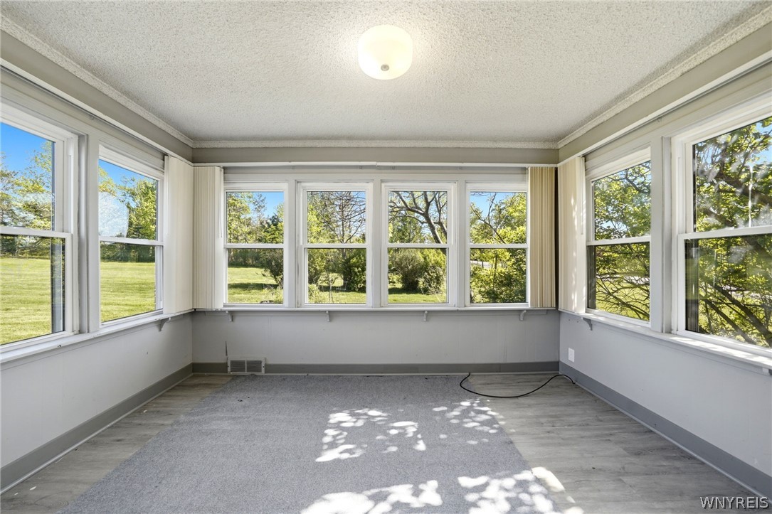 6467 Chestnut Ridge Road Orchard Park, NY 14127 - Photo 7 of 45 Heated Sunroom