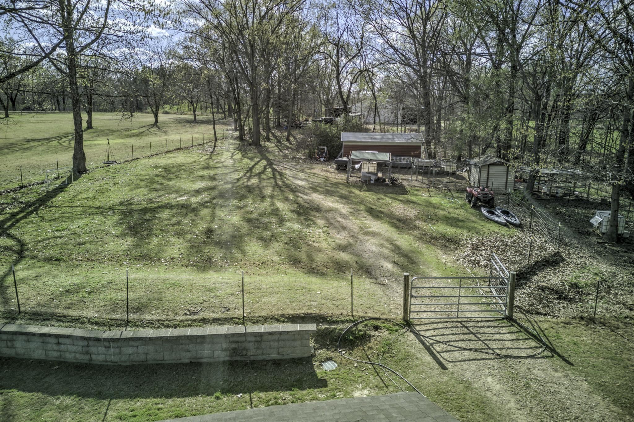 4501 Oak Road Bartlett, TN 38002 - Photo 39 of 40 Land Line goes to Back fence almost to back neighbors Storage Building