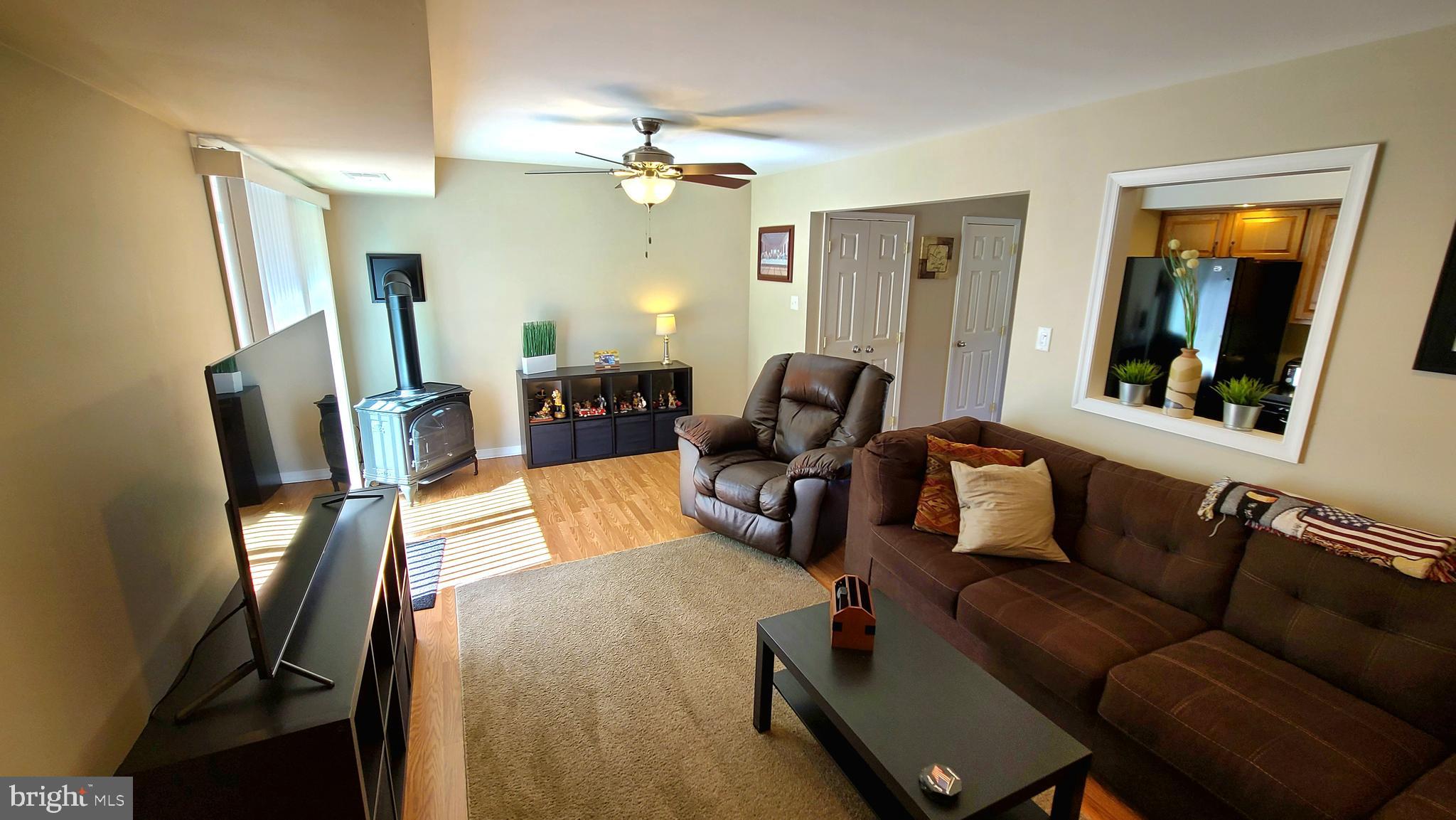 45 Stonegate Road Quakertown, PA 18951 - Photo 3 of 18 Living Room with Patio Door to Fenced Yard!