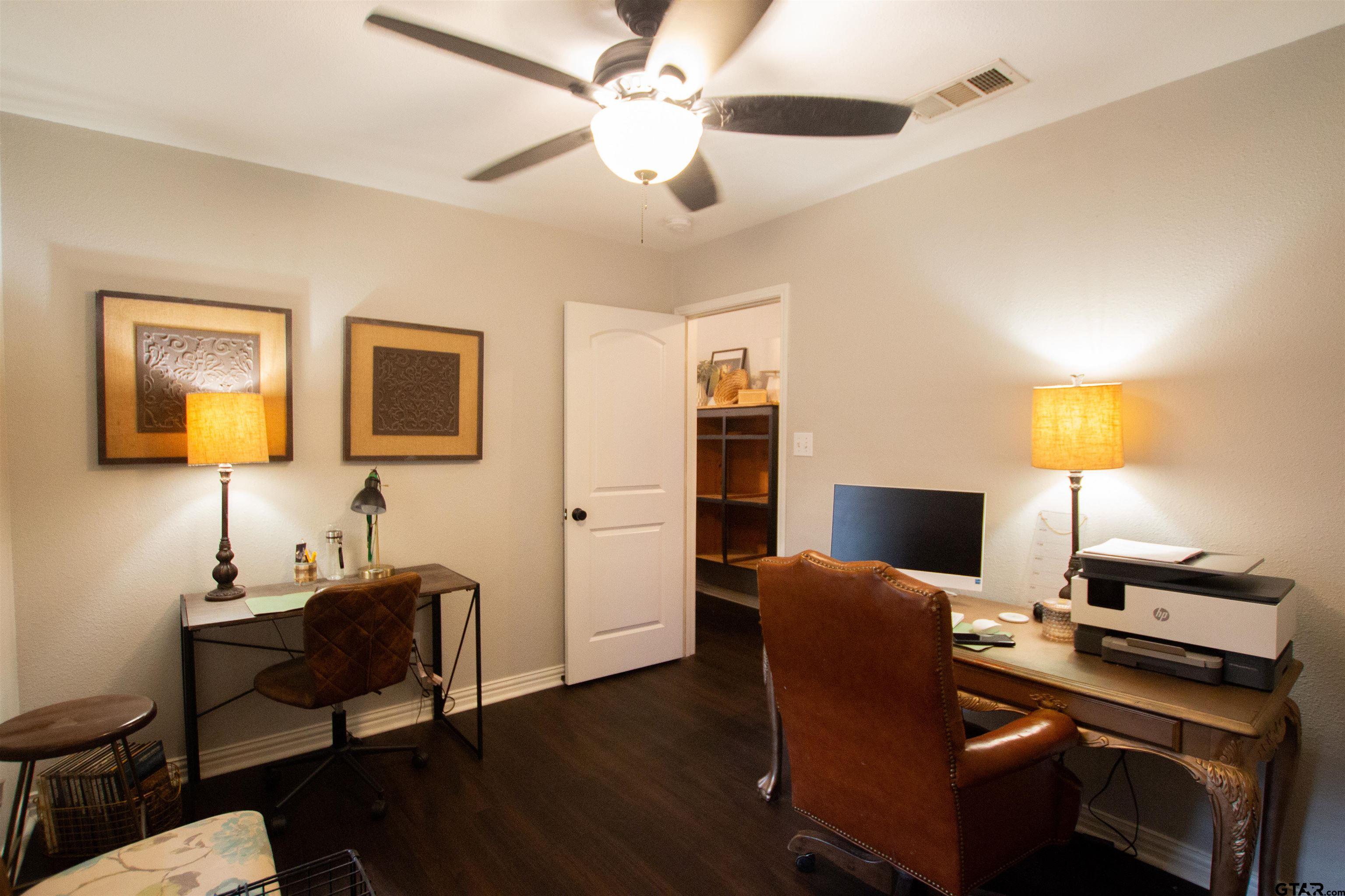 551 Frederick Circle Flint, TX 75762 - Photo 13 of 24 a view of a workspace with furniture and a flat screen tv