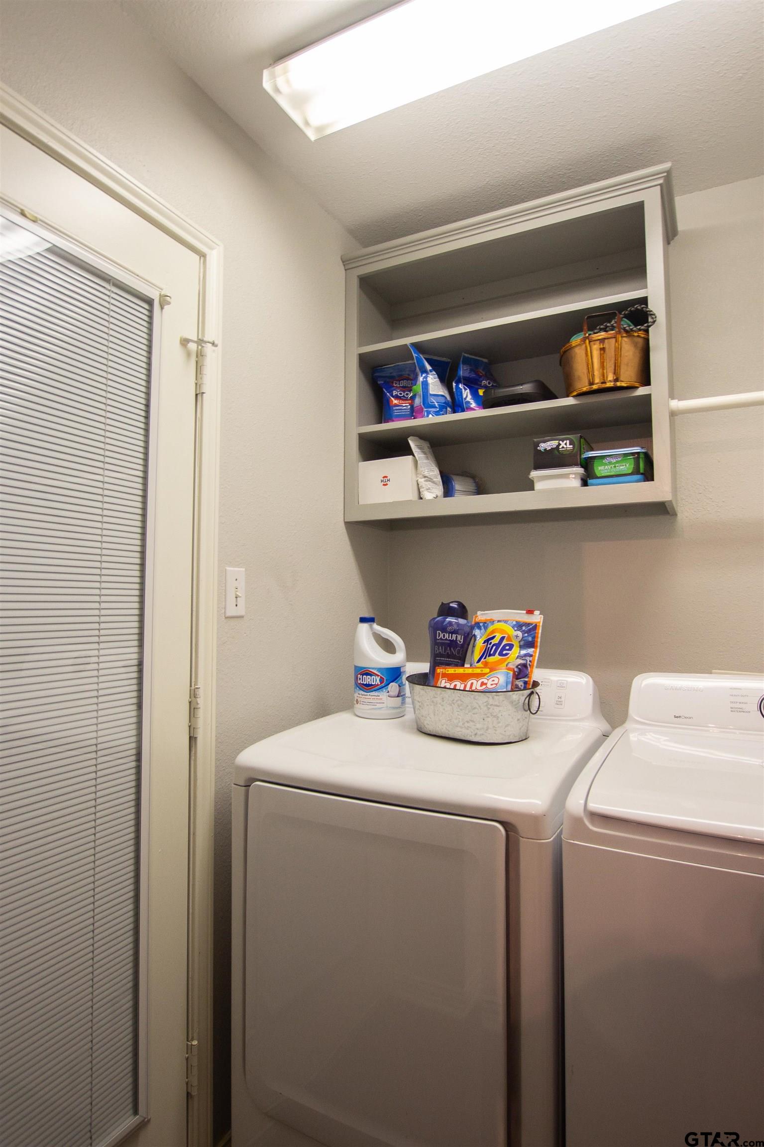 551 Frederick Circle Flint, TX 75762 - Photo 21 of 24 a utility room with dryer and washer