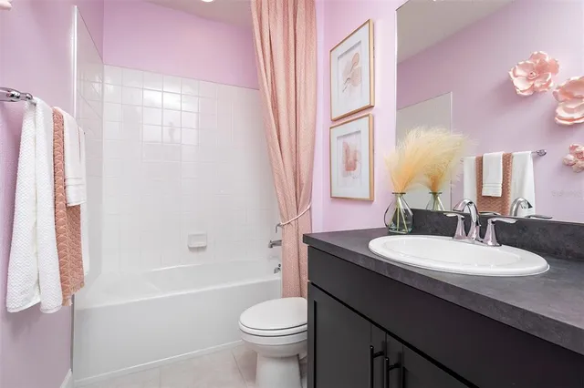 a kitchen with stainless steel appliances granite countertop a stove and a microwave