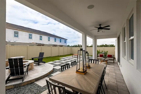 an aerial view of a house with a lake view