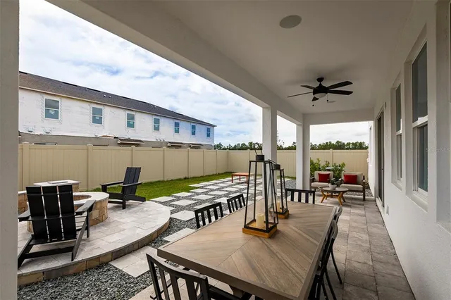 an aerial view of a house with a lake view