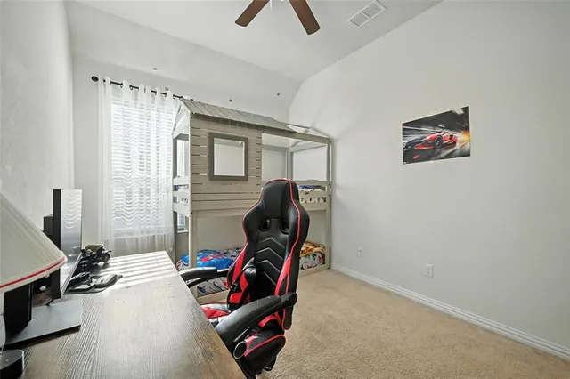 a room with furniture and a flat screen tv