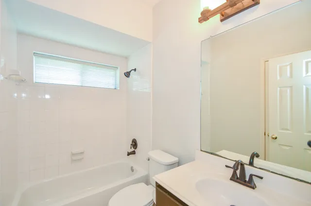 a bathroom with a sink and a bathtub