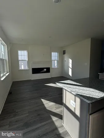 a kitchen with a stove and a sink