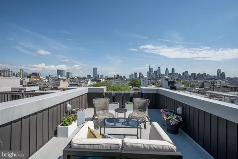 a view of a balcony with city view