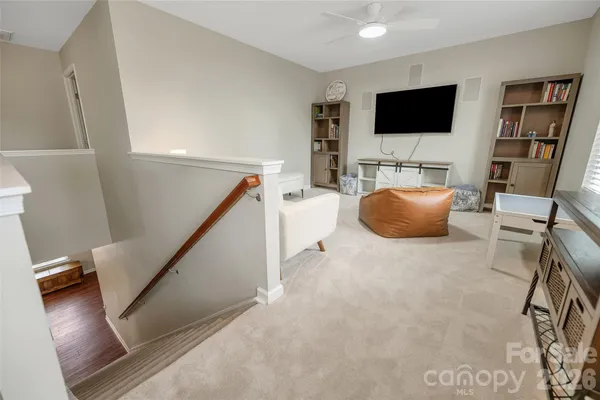 a bedroom with a bed and a desk