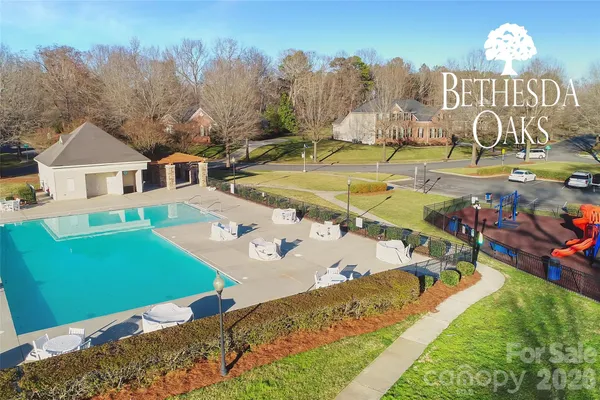 a view of an outdoor space pool patio and outdoor seating
