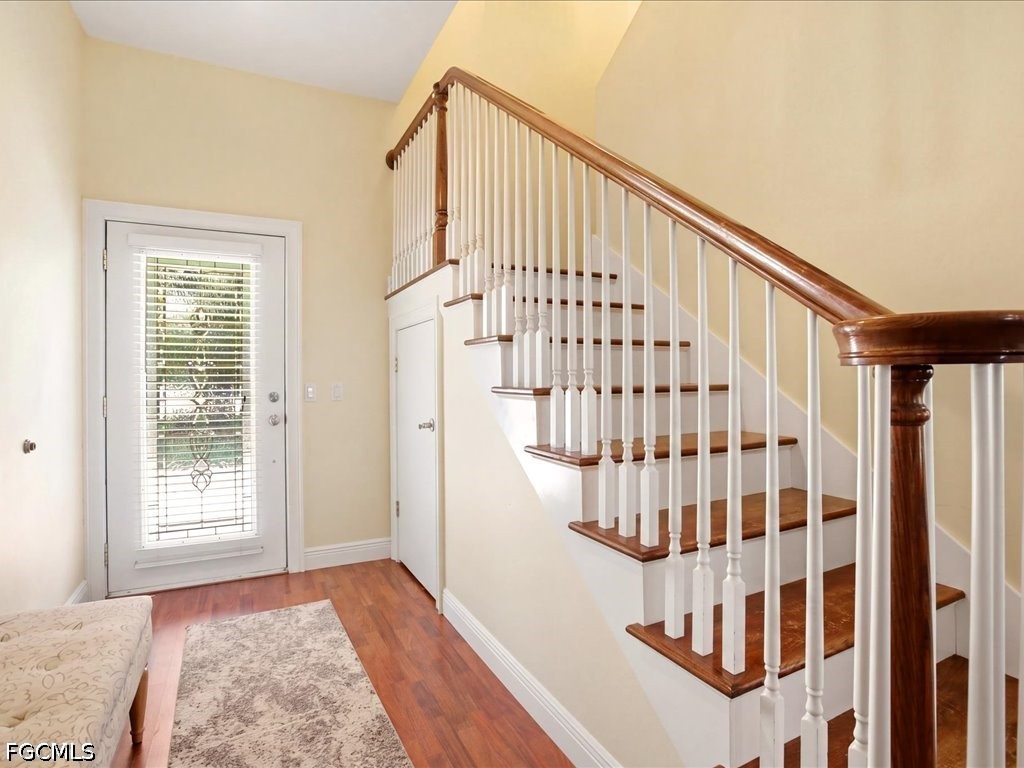 21651 Tuckahoe Road Alva, FL 33920 - Photo 13 of 42 a view of entryway with wooden floor