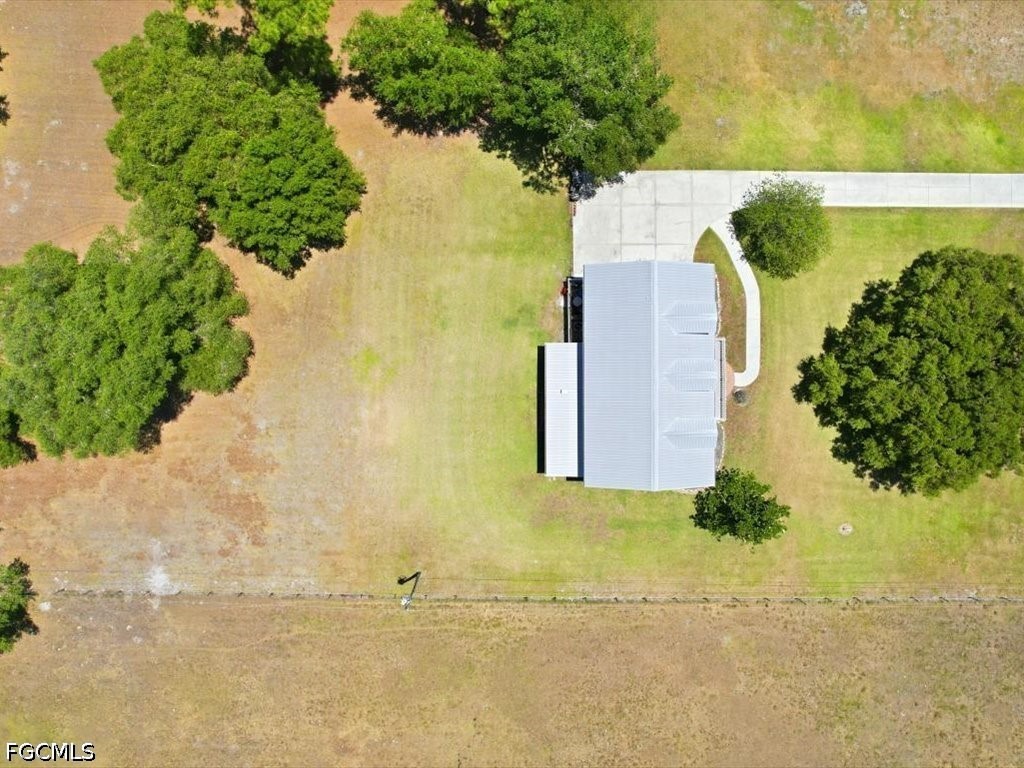 21651 Tuckahoe Road Alva, FL 33920 - Photo 39 of 42 an aerial view of a house with a yard