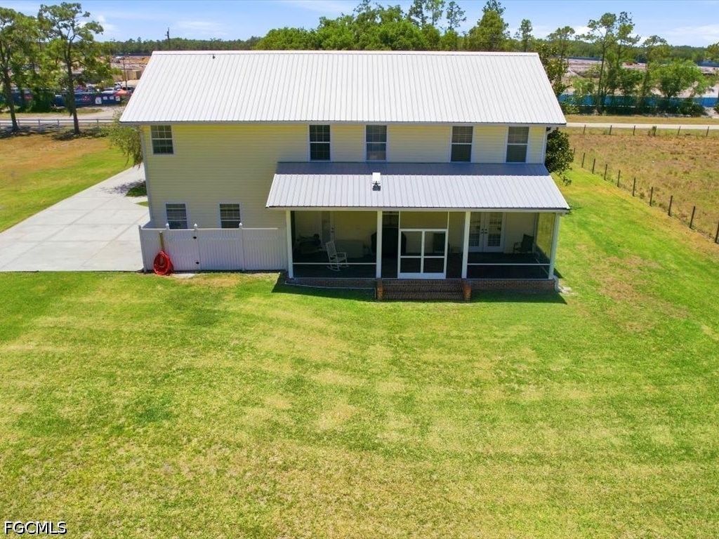 21651 Tuckahoe Road Alva, FL 33920 - Photo 40 of 42 a aerial view of a house with a swimming pool
