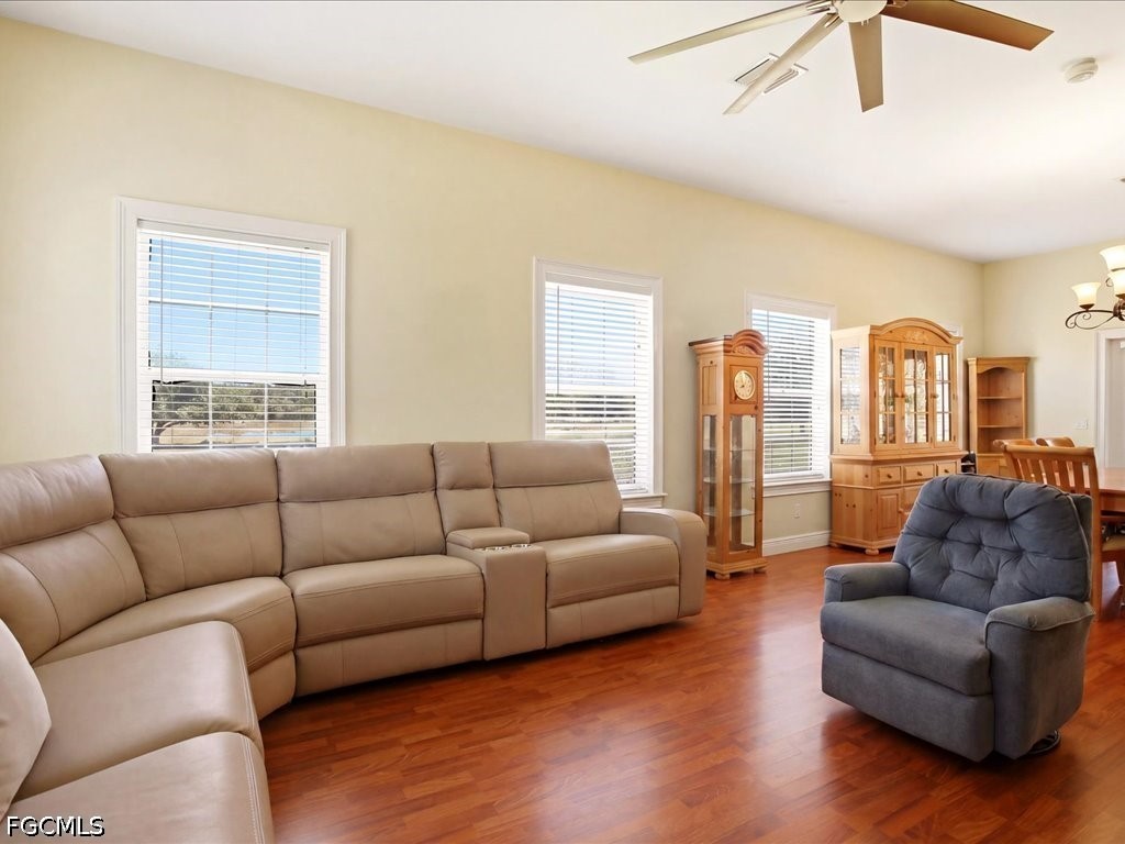21651 Tuckahoe Road Alva, FL 33920 - Photo 6 of 42 a living room with furniture and a large window