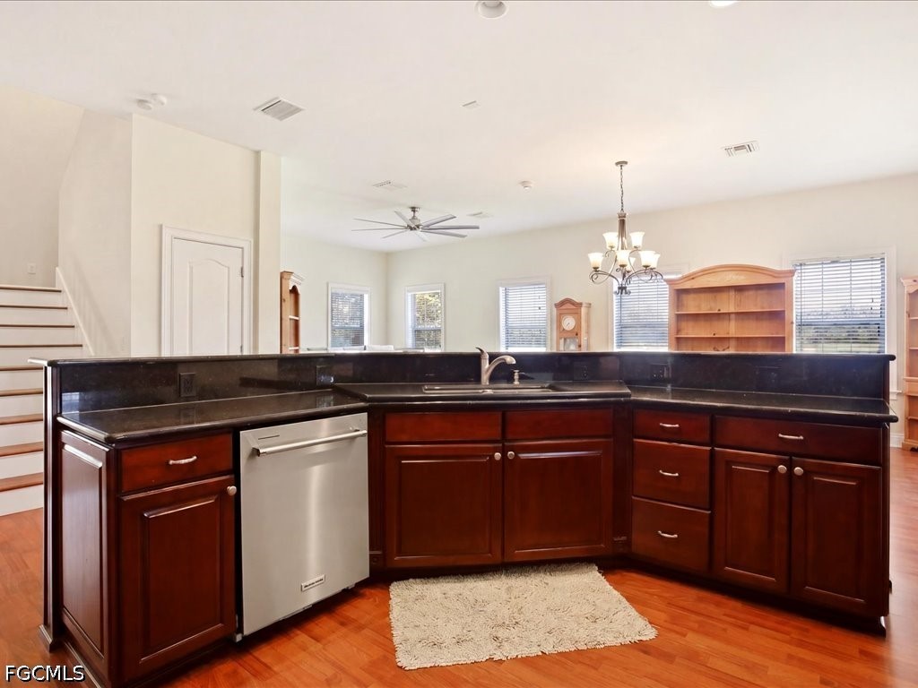 21651 Tuckahoe Road Alva, FL 33920 - Photo 9 of 42 a kitchen with a sink and stove