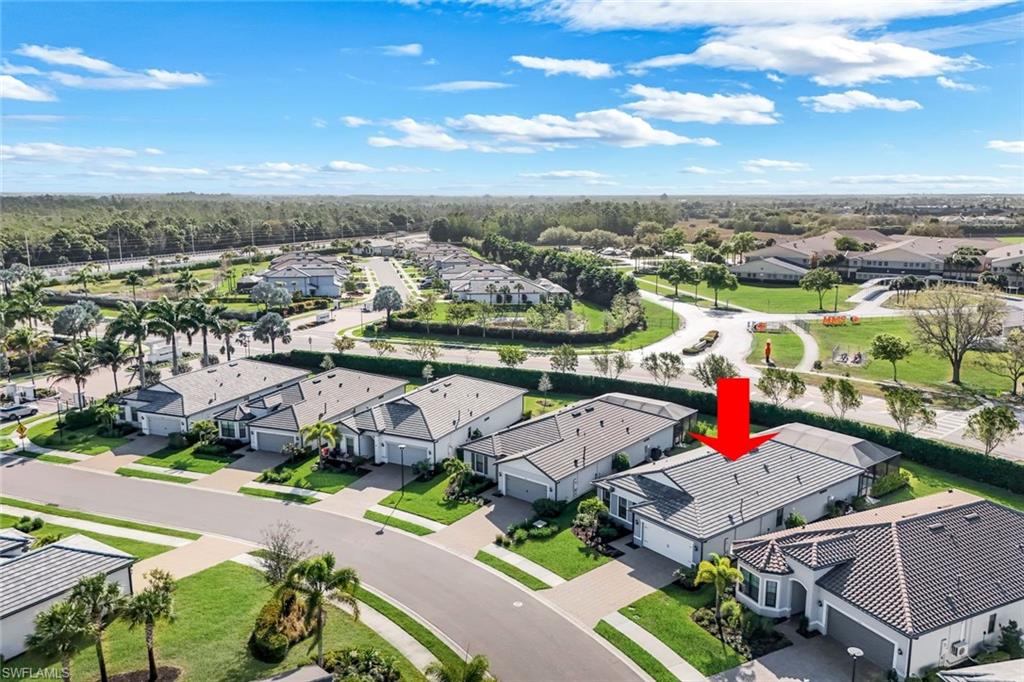 1944 Yellowfin Circle Naples, FL 34114 - Photo 30 of 36 an aerial view of residential houses with outdoor space