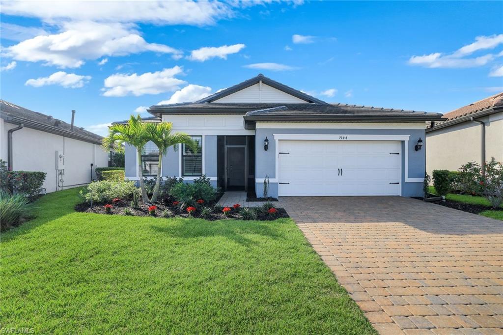 1944 Yellowfin Circle Naples, FL 34114 - Photo 3 of 36 a view of a house with a yard