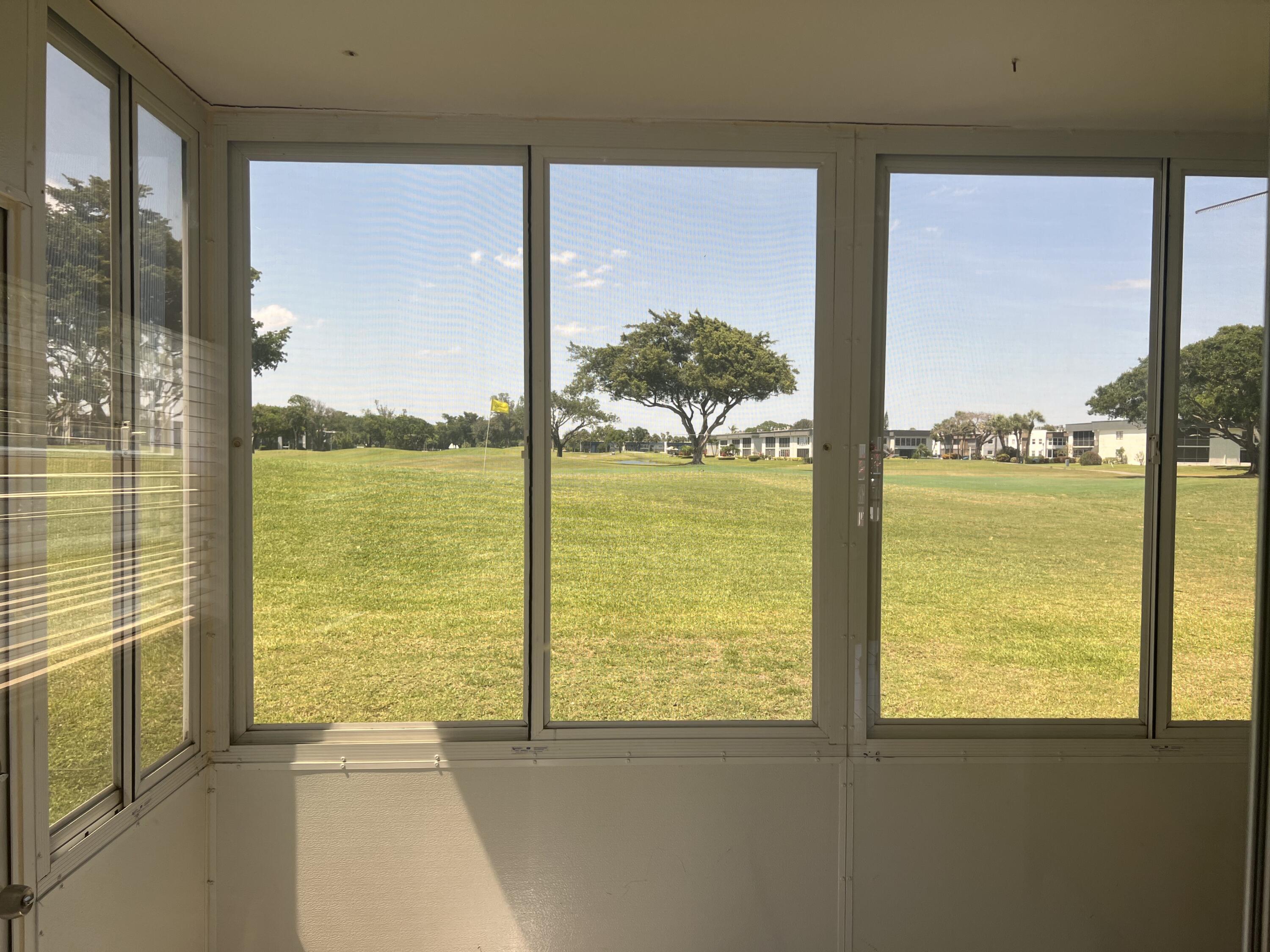 592 Flanders North Delray Beach, FL 33484 - Photo 21 of 33 Golf view from porch