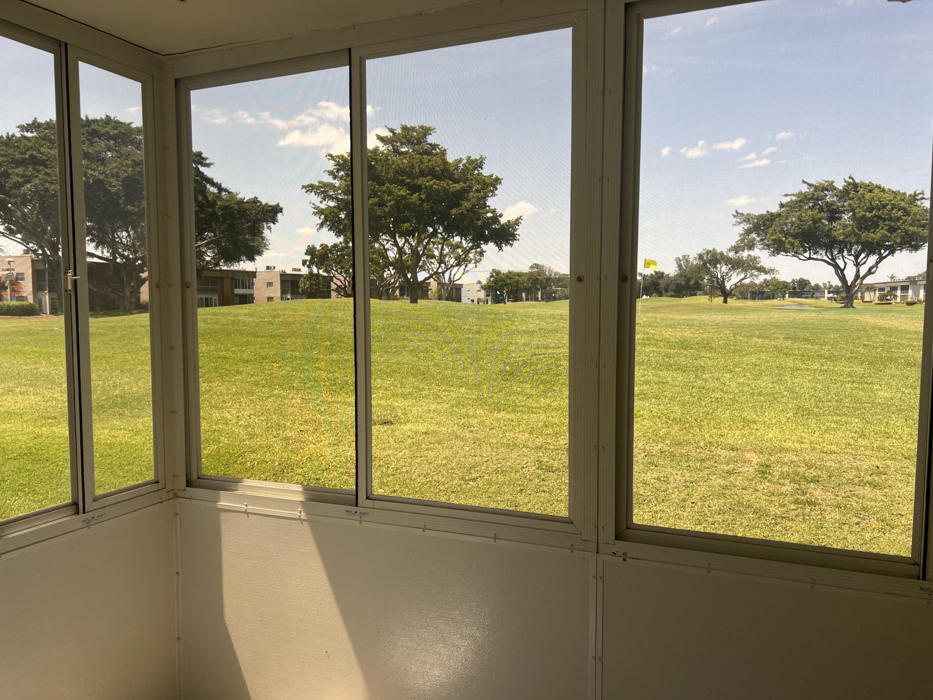 592 Flanders North Delray Beach, FL 33484 - Photo 22 of 33 Golf view from porch