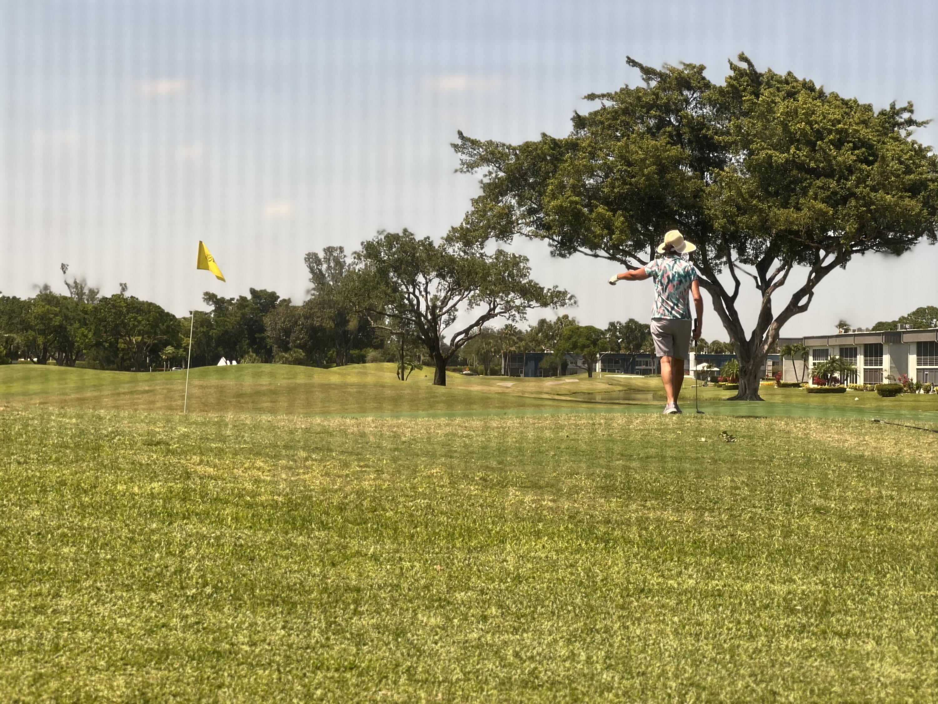 592 Flanders North Delray Beach, FL 33484 - Photo 23 of 33 Golf view from porch