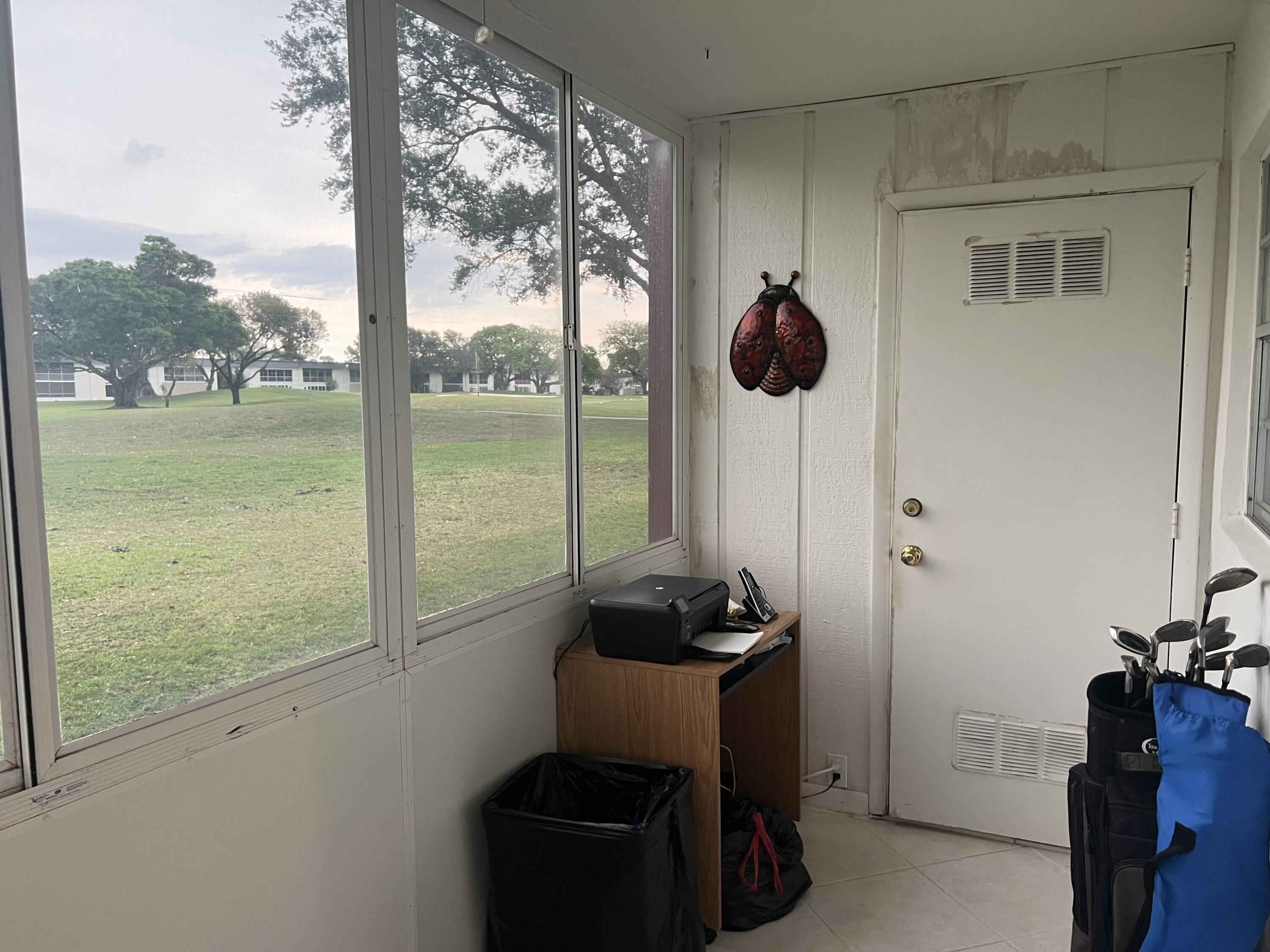 592 Flanders North Delray Beach, FL 33484 - Photo 25 of 33 Screened in porch-golf view