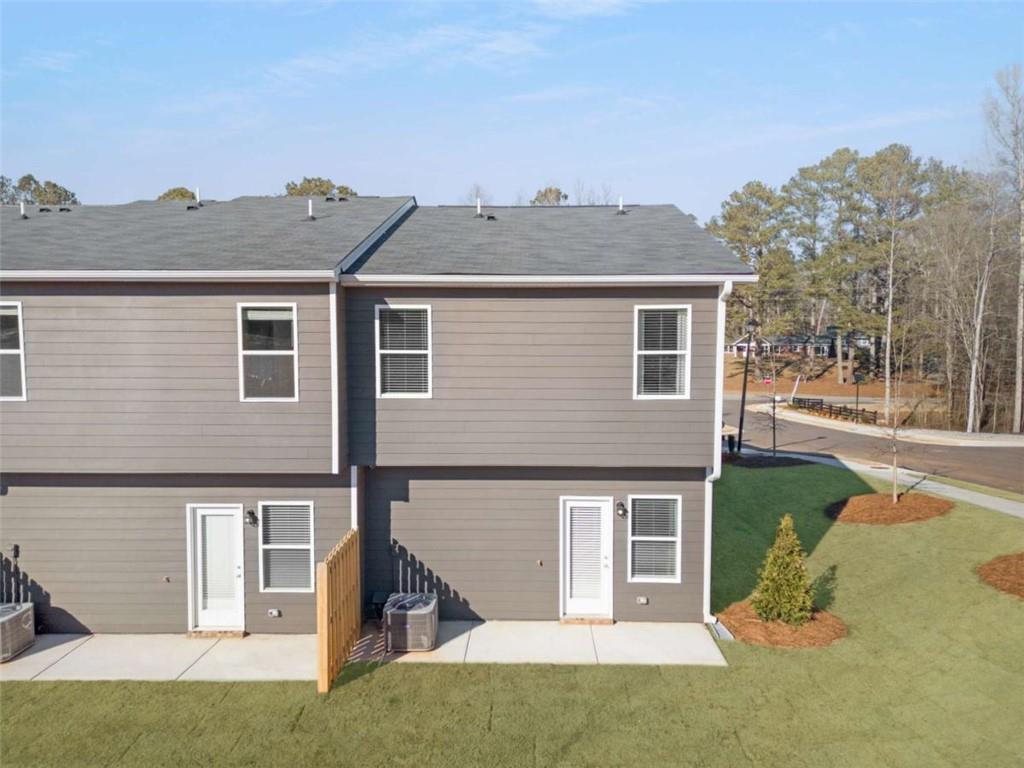 211 Ivey Terrace Temple, GA 30179 - Photo 26 of 26 a front view of a house with a yard and garage
