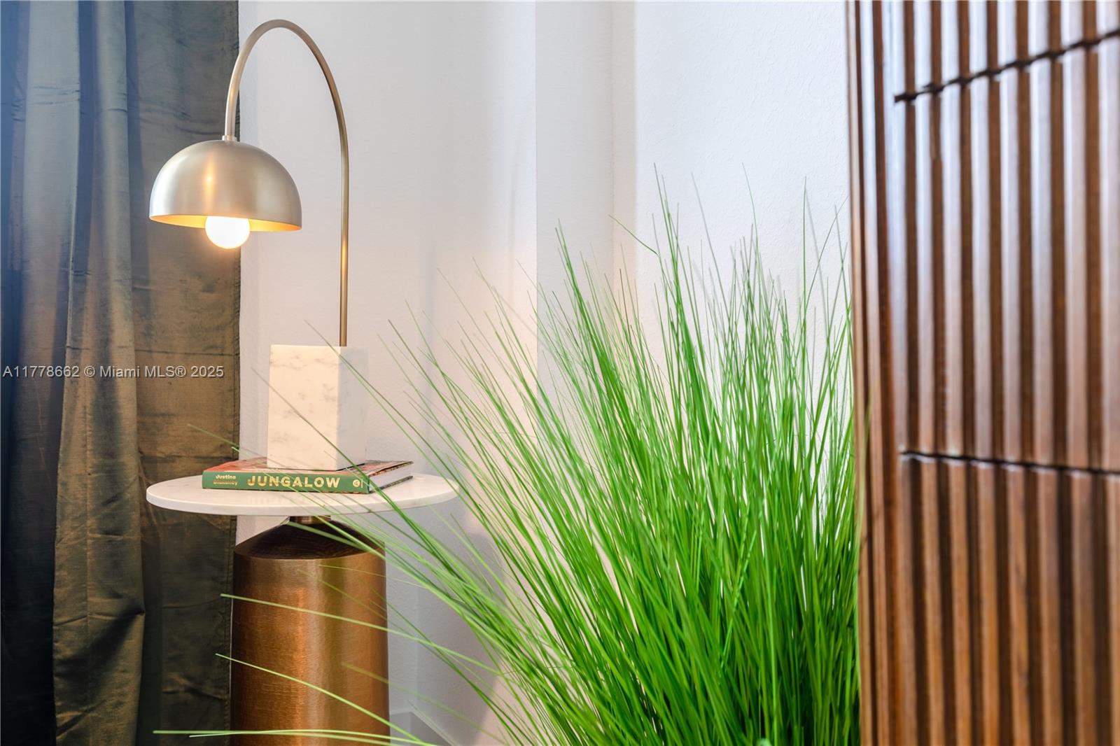 1005 Spring Garden Road, Unit PH801 Miami, FL 33136 - Photo 5 of 38 a room with a large window and entryway