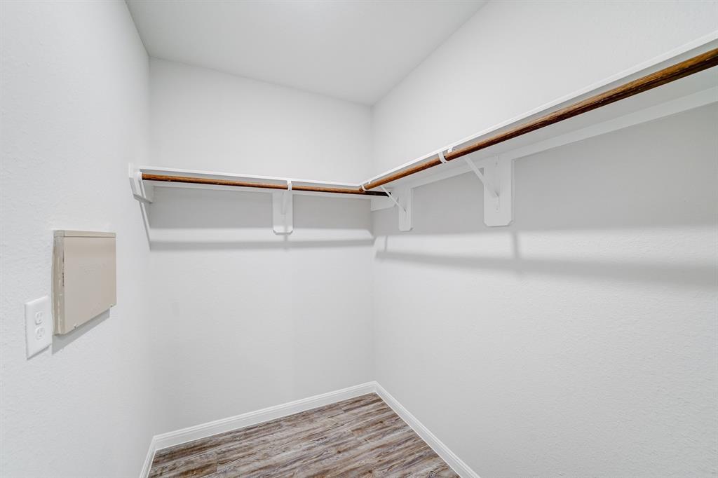 307 Victory Drive Mabank, TX 75147 - Photo 19 of 31 a view of an empty walk in closet