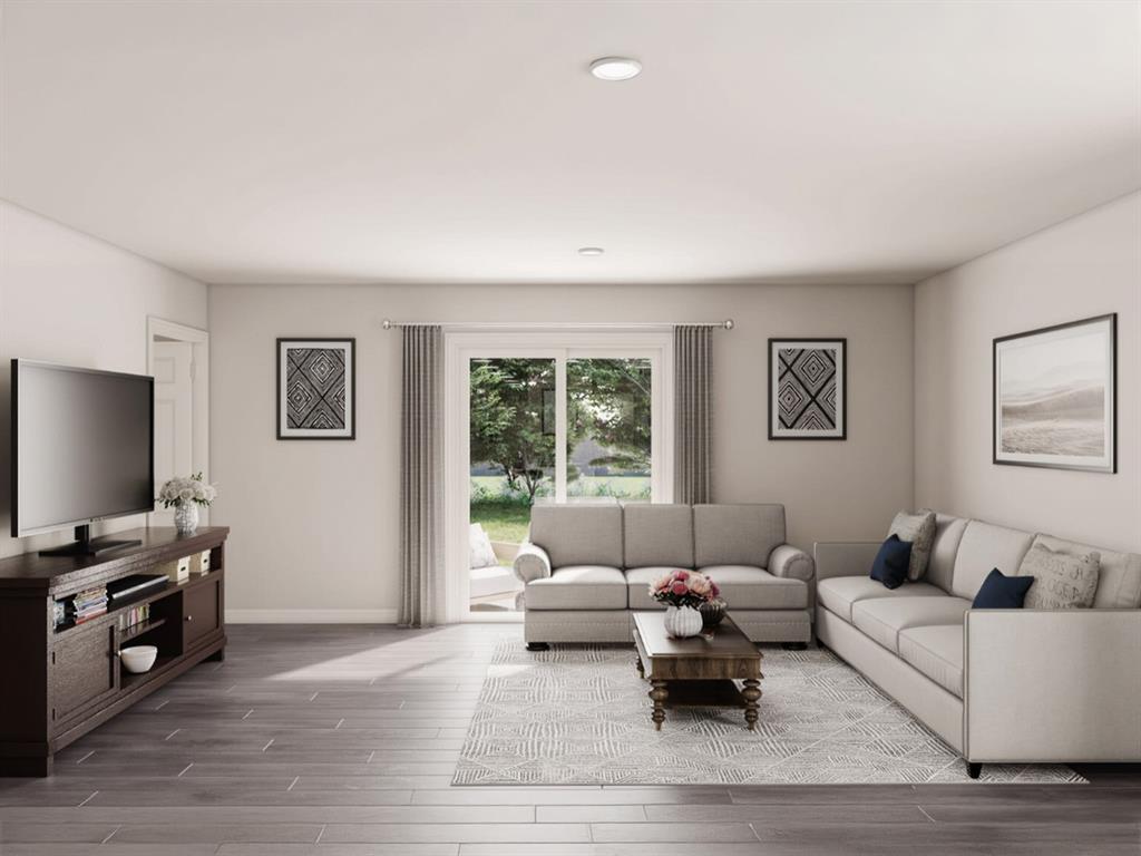 307 Victory Drive Mabank, TX 75147 - Photo 6 of 31 a living room with furniture and a flat screen tv