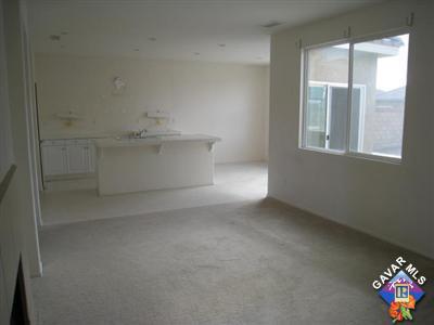 45501 Stanridge Avenue Lancaster, CA 93535 - Photo 4 of 7 a view of an empty room with a window