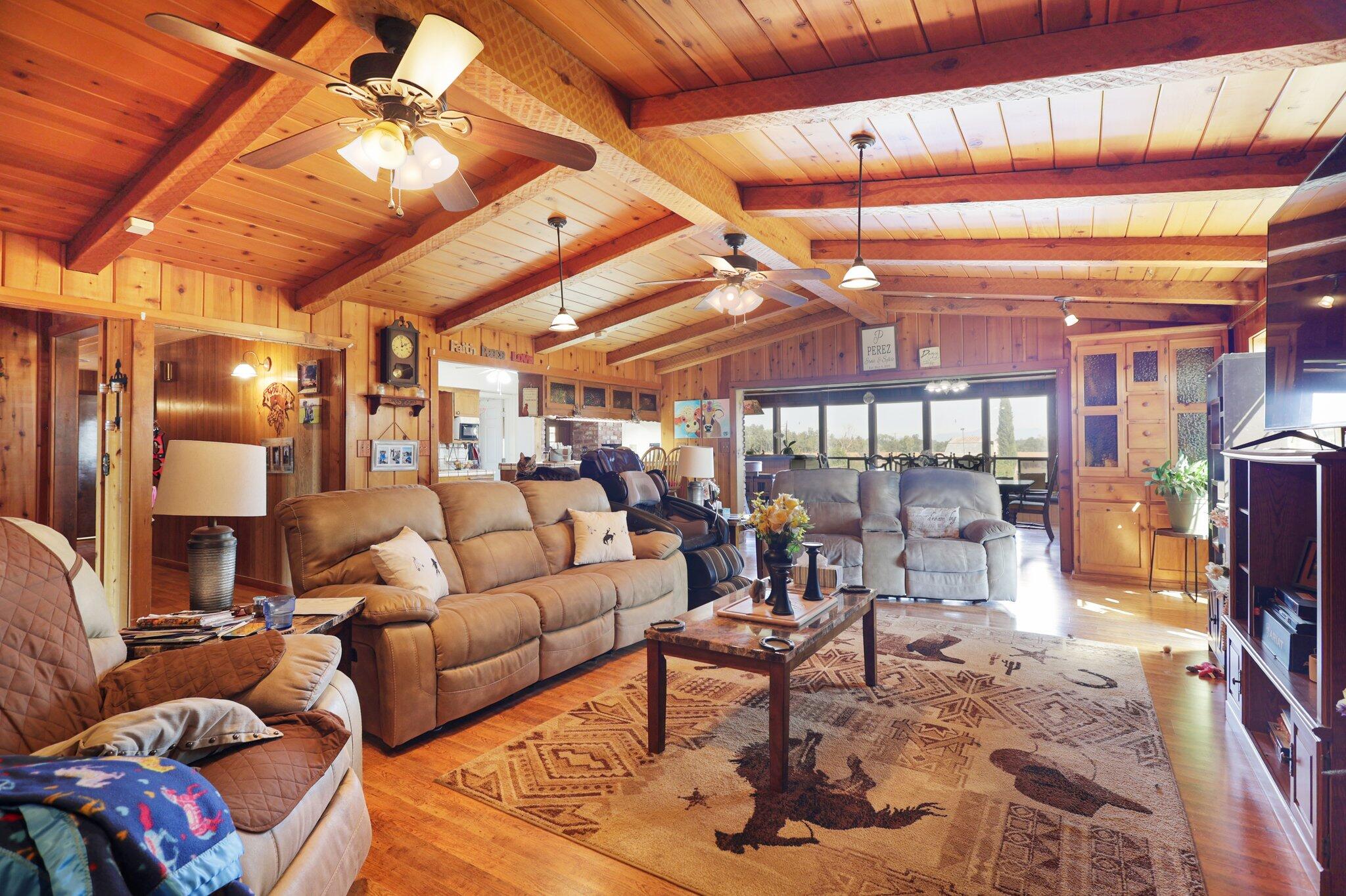 5078 Balls Ferry Road Anderson, CA 96007 - Photo 11 of 113 a living room with furniture and a ceiling fan