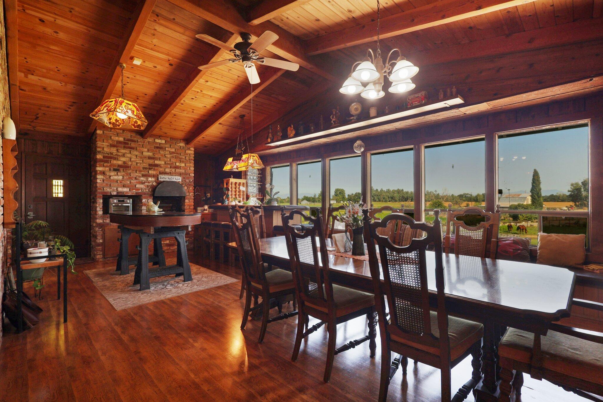 5078 Balls Ferry Road Anderson, CA 96007 - Photo 15 of 113 a view of a dining room with furniture window and wooden floor