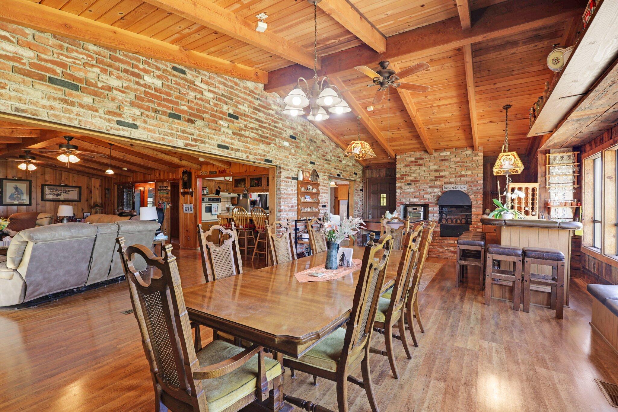 5078 Balls Ferry Road Anderson, CA 96007 - Photo 17 of 113 a view of a dining room with furniture and wooden floor