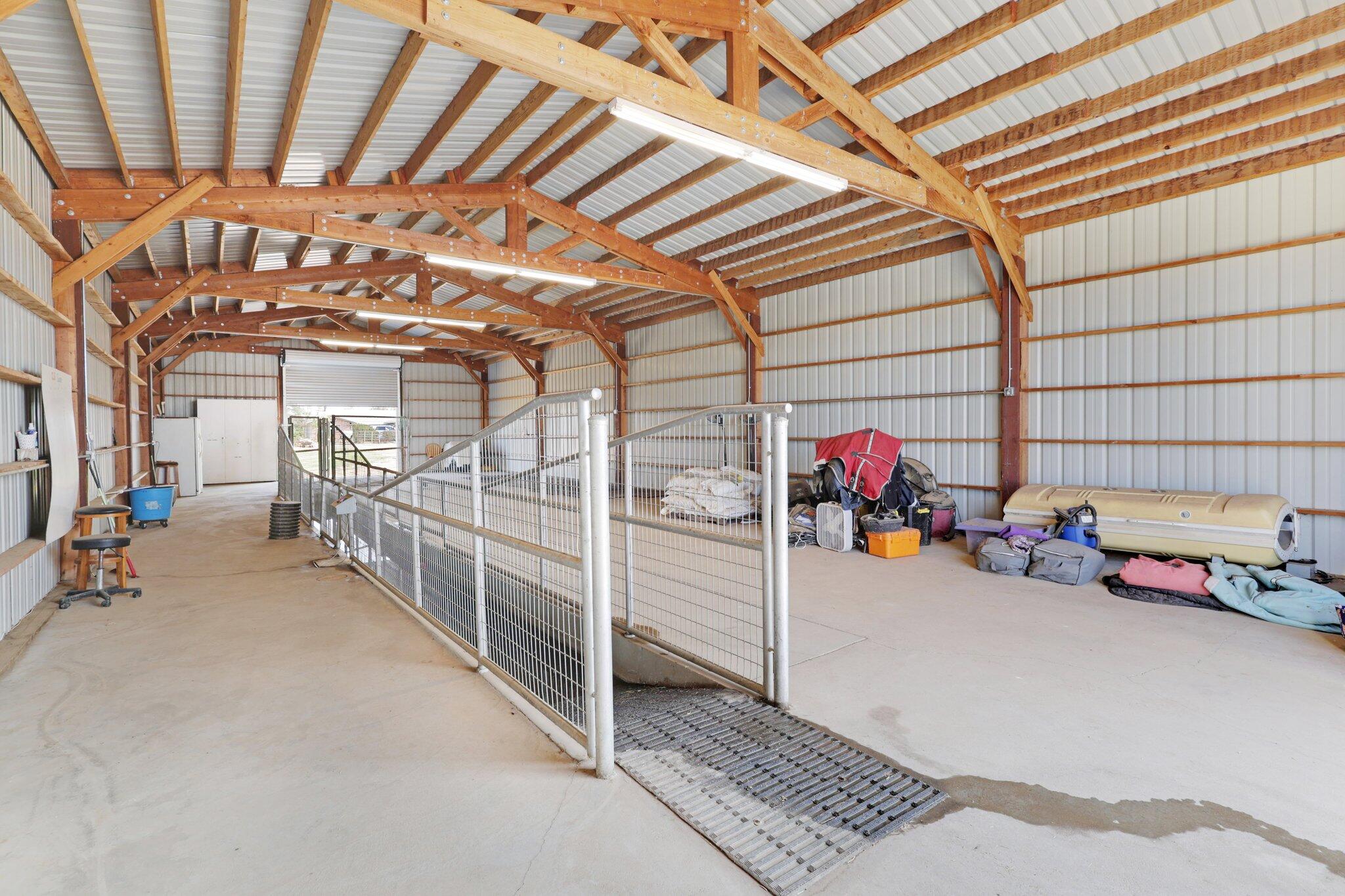 5078 Balls Ferry Road Anderson, CA 96007 - Photo 53 of 113 a view of a garage with rack and bicycle