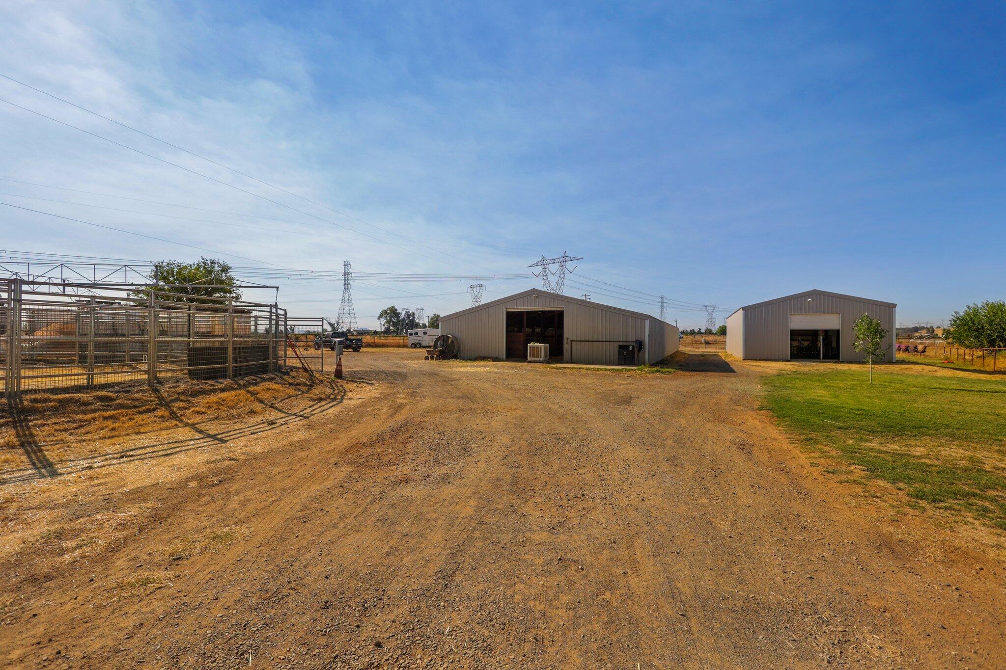 5078 Balls Ferry Road Anderson, CA 96007 - Photo 60 of 113 a front view of a house with a yard