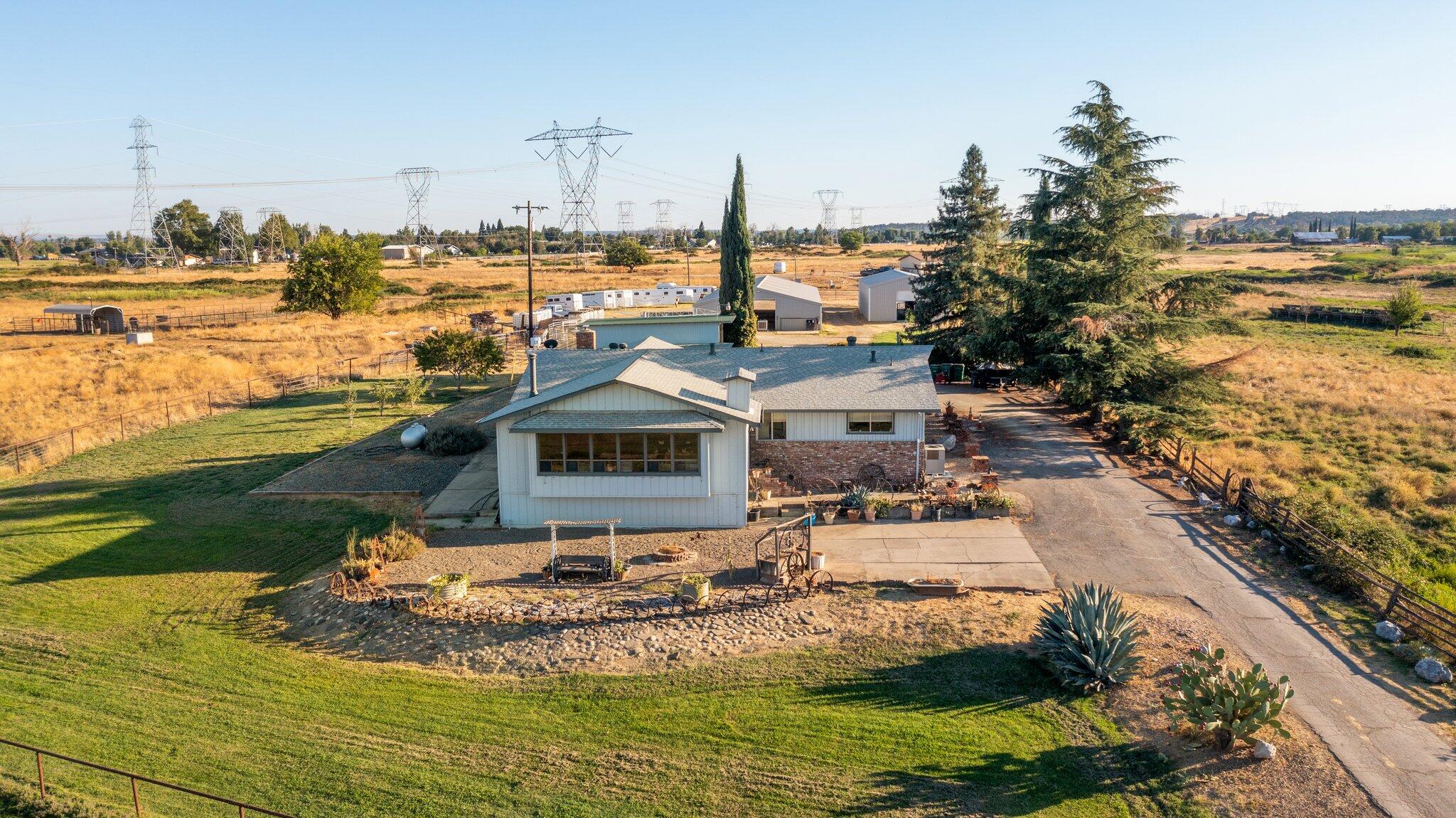 5078 Balls Ferry Road Anderson, CA 96007 - Photo 6 of 113 a view of a house with a yard and lake view