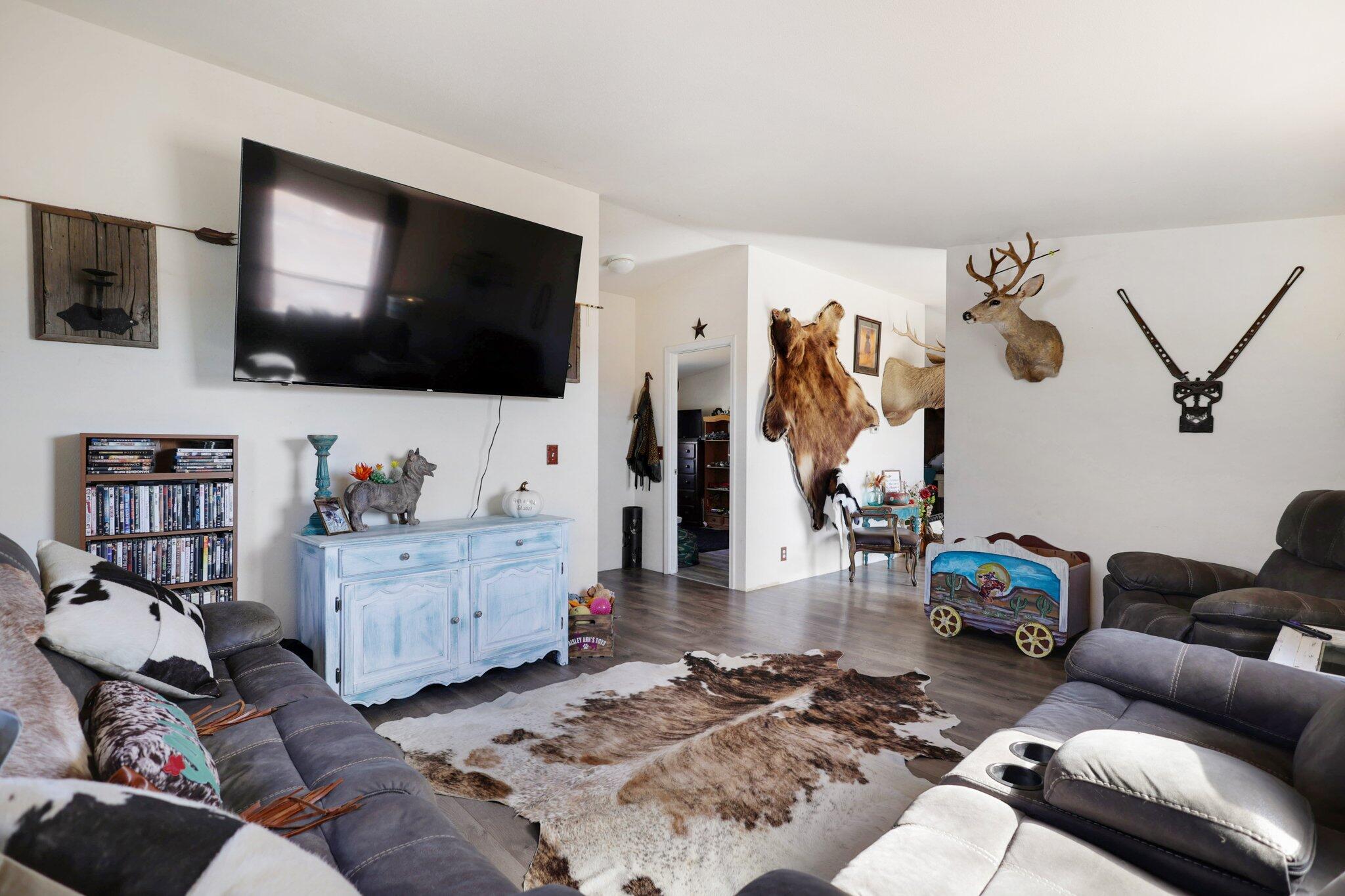 5078 Balls Ferry Road Anderson, CA 96007 - Photo 68 of 113 a living room with furniture and a flat screen tv