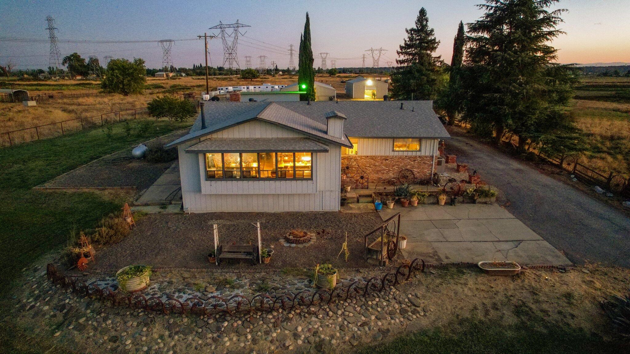 5078 Balls Ferry Road Anderson, CA 96007 - Photo 7 of 113 a view of a house with a yard